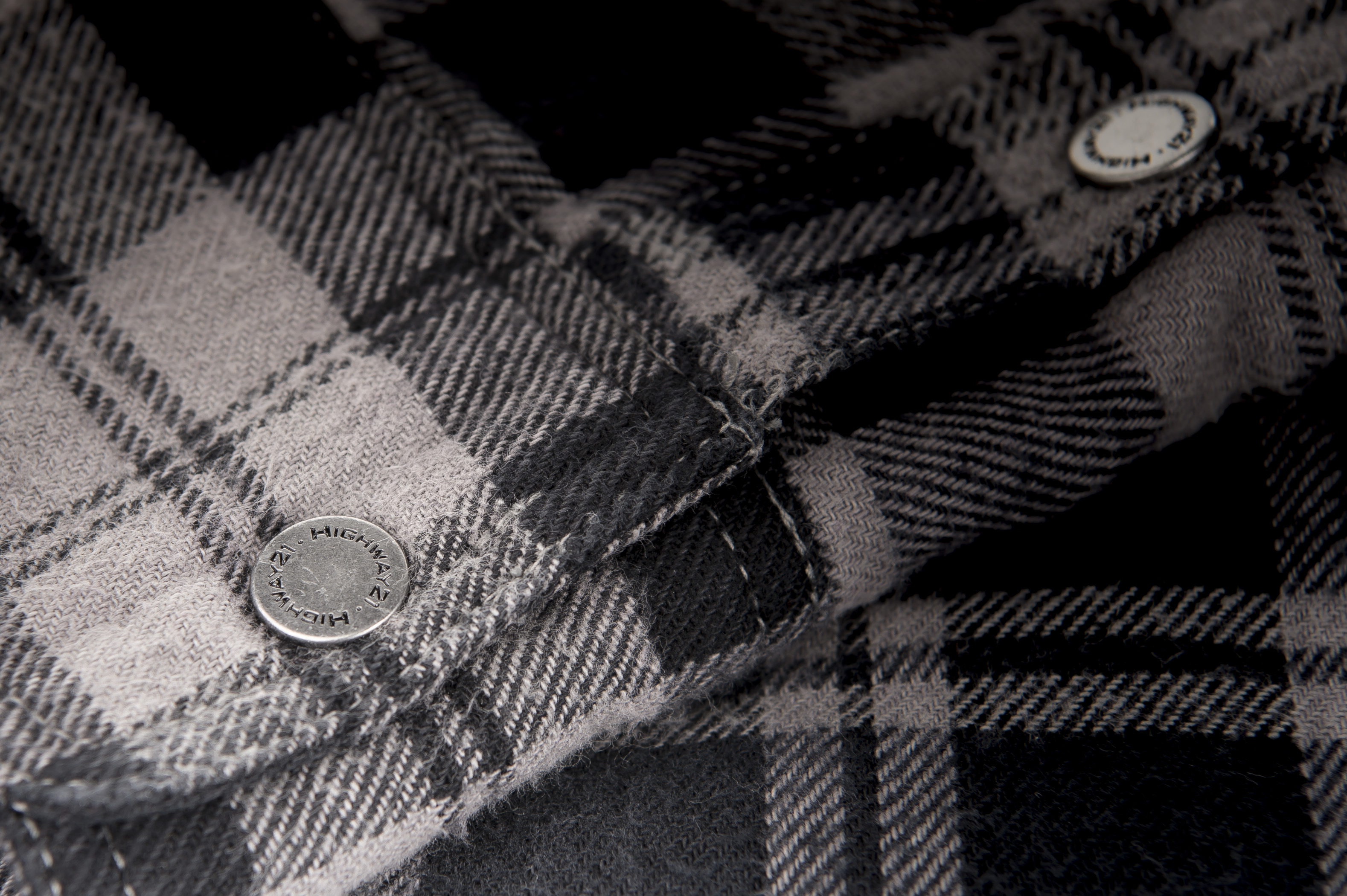 Stitching detail on the black and grey Marksman flannel